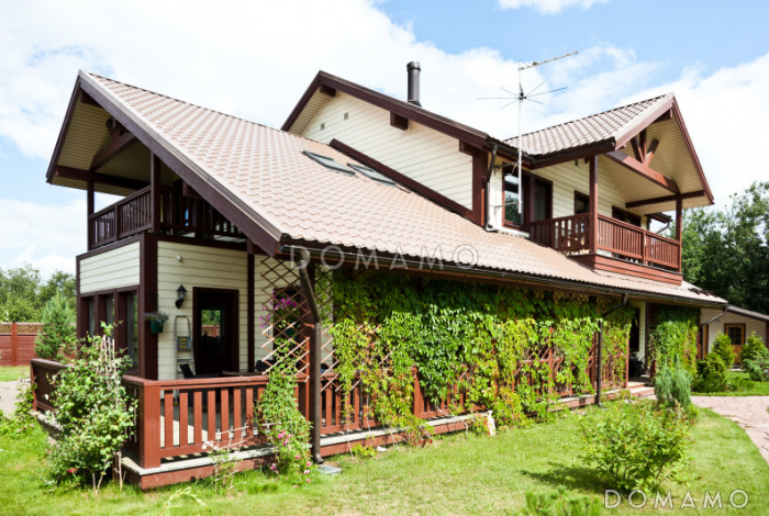 Проект кирпичного дома с просторной кухней и вторым светом