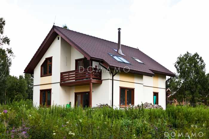 Проект кирпичного дома 9 на 10 с четырьмя спальнями