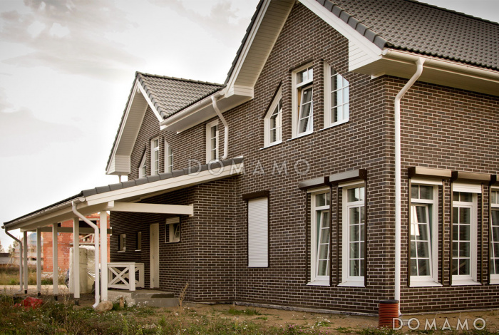 Проект каркасного дома с навесом и гаражом