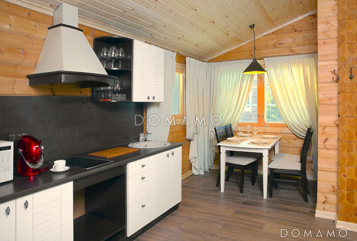 Проект небольшого одноэтажного деревянного дома из клееного бруса с двумя спальнями