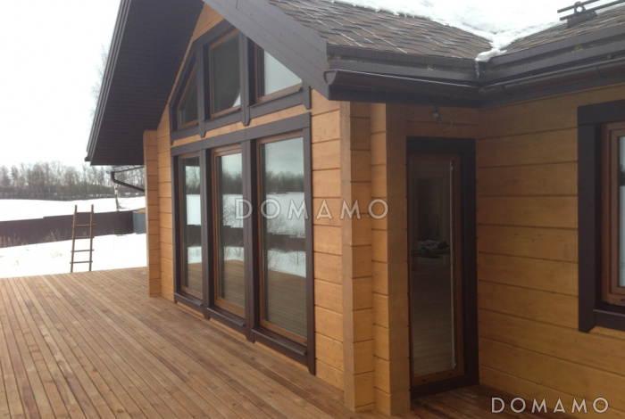 Проект одноэтажного деревянного дома из клееного бруса с изолированной небольшой кухней