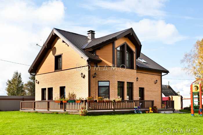 Проект кирпичного дома с эркером