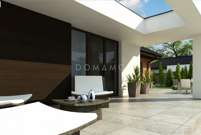 Проект одноэтажного просторного дома из газобетона с отрытой террасой и гаражом для двух автомобилей 