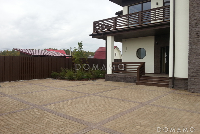 Проект двухэтажного каркасного дома с большими окнами