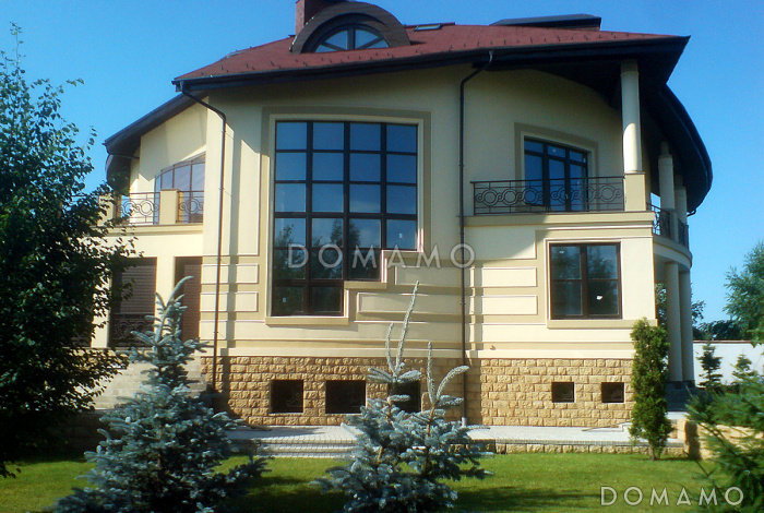 Проект современного дома с мансардным и цокольным этажом