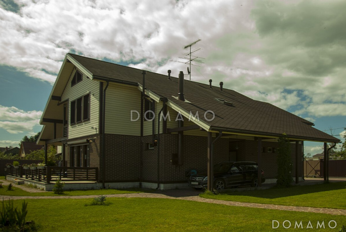 Проект дома из газобетонных блоков с отделкой из двух материалов