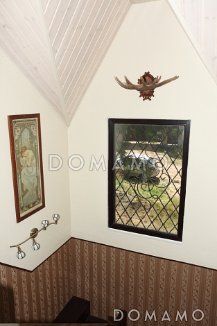 Проект дома из пеноблоков в стиле фахверк с сауной на мансардном этаже