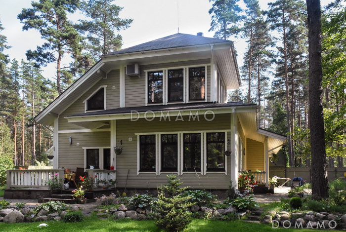 Проект каркасного дома с местом для трех авто