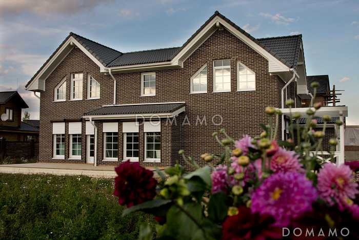 Проект дома из пеноблоков с открытой террасой