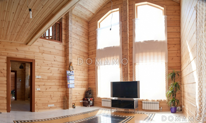 Проект деревянного дома из клееного бруса с просторной прихожей