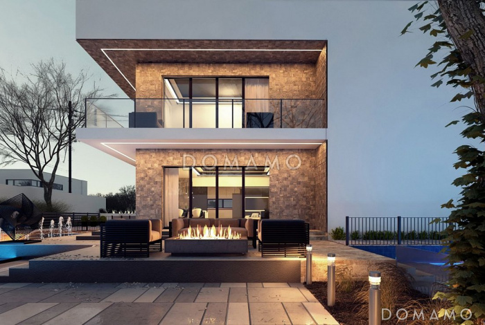 Проект современного двухэтажного дома из газобетона с плоской крышей, с четырьмя комнатами, гаражом и угловой лоджией