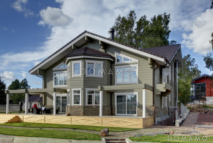 Проект огромного дома из клееного бруса общей площадью более 600 м2