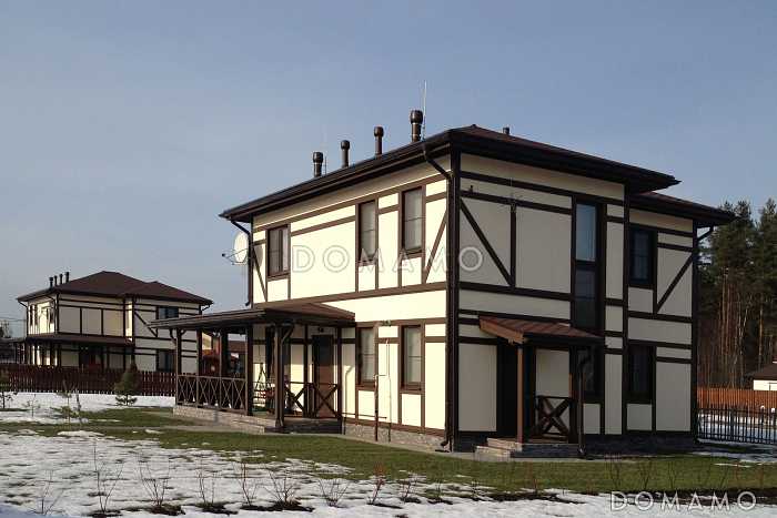 Проект двухэтажного дома из пеноблоков в стиле фахверк