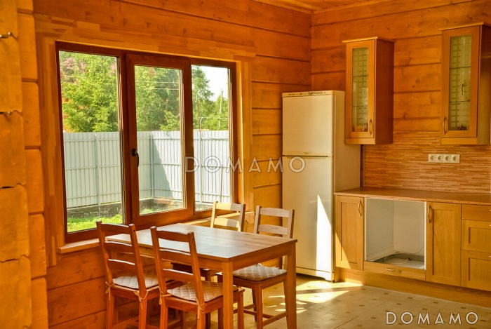 Проект деревянного дома из клееного бруса с гостинной на втором этаже