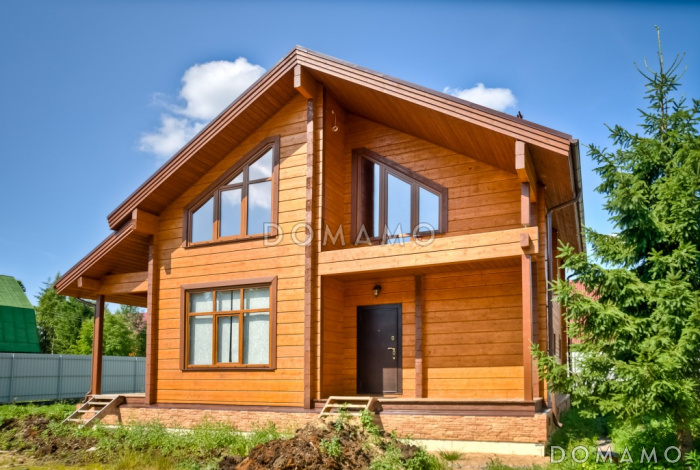 Проект деревянного дома из клееного бруса с гостинной на втором этаже