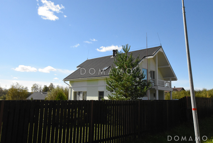 Проект кирпичного дома с угловой террасой