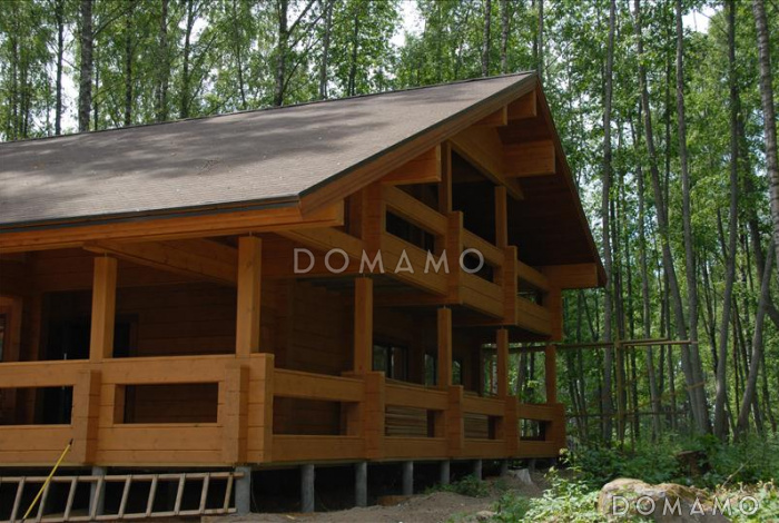 Проект дома из клееного бруса с красивыми крытыми террасами