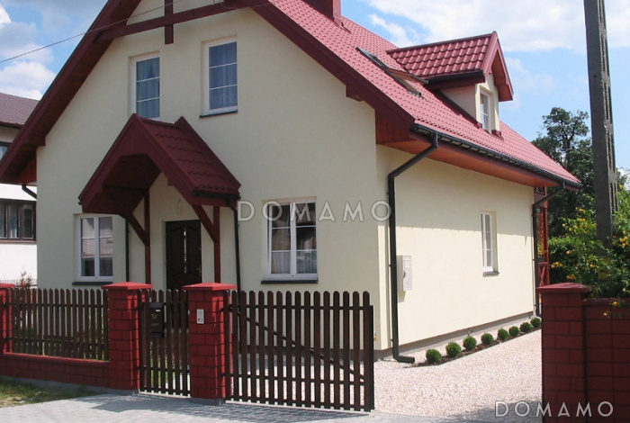 Проект одноэтажного дома из газобетона с мансардой и просторной гостиной