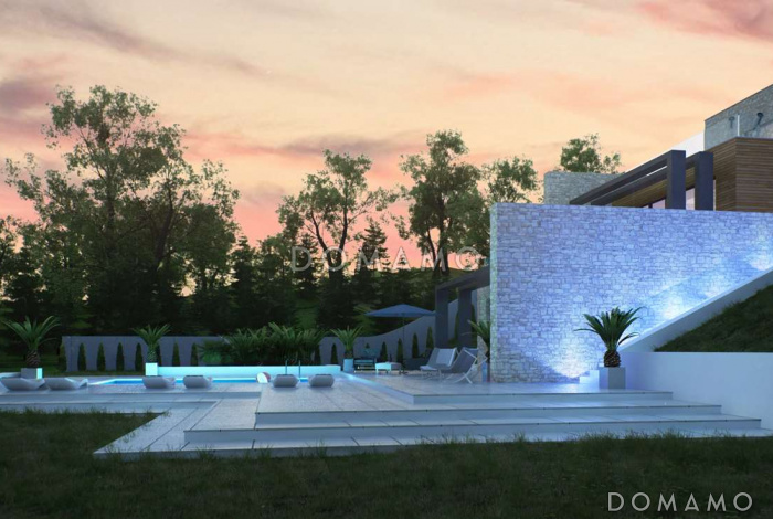 Проект красивого просторного двухэтажного коттеджа из кирпича с бассейном на цокольном этаже