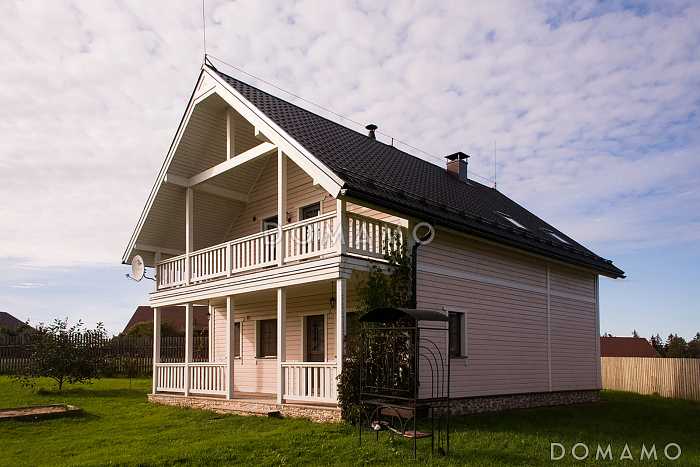 Проект дома из пеноблоков с мансардными окнами