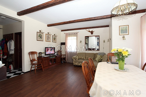 Проект дома из кирпича с отделкой фасадов в стиле фахверк, сауной на мансардном этаже